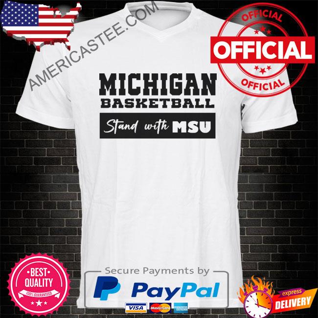Michigan basketball stand with MSU shirt